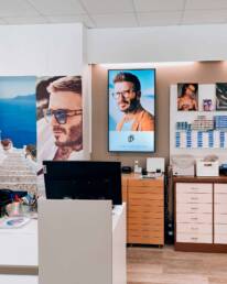 Ottica Dario Bertuletti monitor interno marketing displpay verona